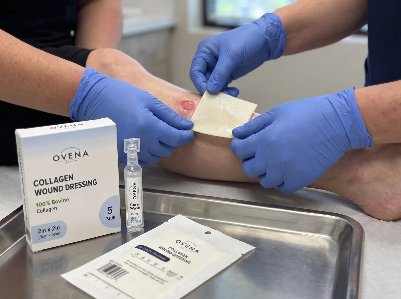 Gloved hands lay a moist Ovena collagen pad onto a small shallow wound on a lower leg; the Collagen Wound Dressing 2 × 2 in box, an opened pouch and an opened Care Wash ampoule sit on the tray in front.